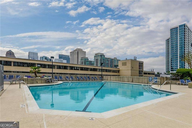 860 Peachtree St NE Unit 1613, Atlanta, GA 30308 - community pool with a city view and a patio area