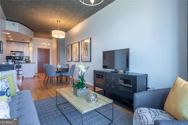 860 Peachtree St NE Unit 1613, Atlanta, GA 30308 - living room with wood finished floors