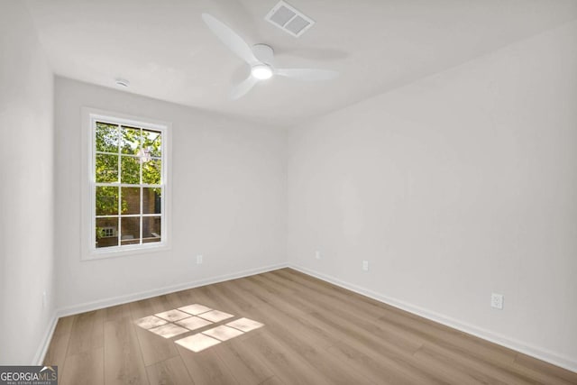 1 N Boundary Pl NW, Atlanta, GA 30318 - empty room with wood finished floors, ceiling fan, and baseboards