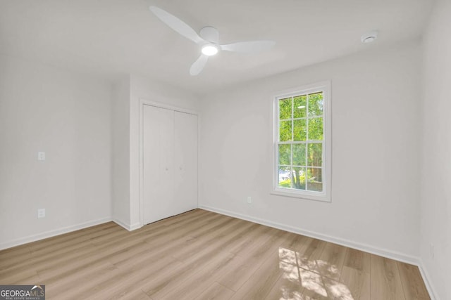 1 N Boundary Pl NW, Atlanta, GA 30318 - unfurnished room with light wood finished floors, baseboards, a ceiling fan, and a smoke detector