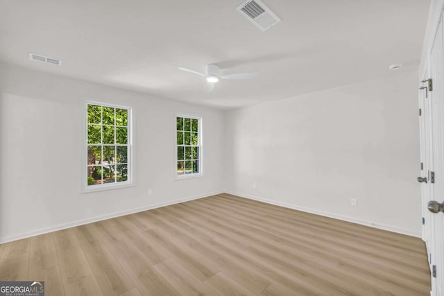 1 N Boundary Pl NW, Atlanta, GA 30318 - empty room with a ceiling fan, light wood-style flooring, and baseboards