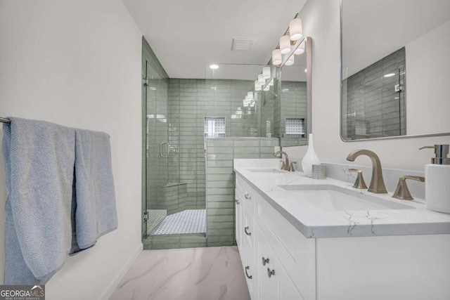 1 N Boundary Pl NW, Atlanta, GA 30318 - bathroom with a stall shower, double vanity, marble finish floors, recessed lighting, and baseboards