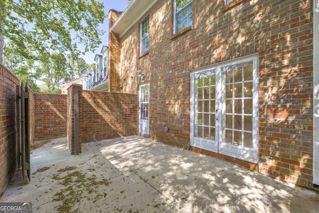 1 N Boundary Pl NW, Atlanta, GA 30318 - view of patio featuring a gate and french doors