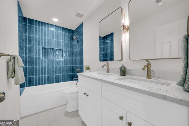 1 N Boundary Pl NW, Atlanta, GA 30318 - bathroom featuring toilet, bathtub / shower combination, double vanity, recessed lighting, and marble finish floors