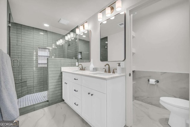 1 N Boundary Pl NW, Atlanta, GA 30318 - bathroom with marble finish flooring, toilet, double vanity, a shower stall, and tile walls