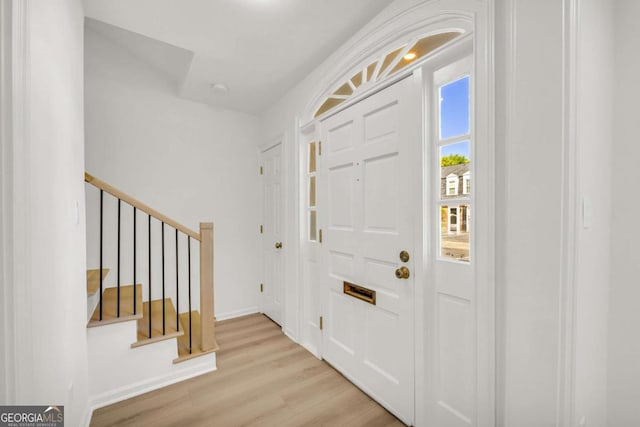 1 N Boundary Pl NW, Atlanta, GA 30318 - foyer entrance with wood finished floors, stairs, and baseboards