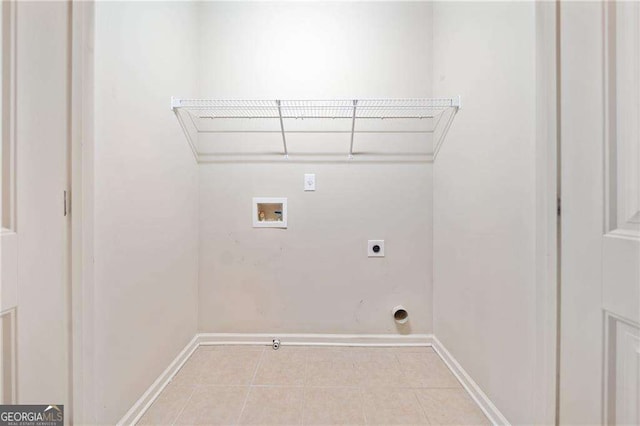 100 Trailside Way, Hiram, GA 30141 - laundry area featuring washer hookup, electric dryer hookup, light tile patterned flooring, and baseboards