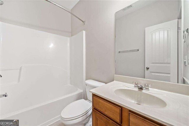 100 Trailside Way, Hiram, GA 30141 - bathroom with toilet, vanity, and bathing tub / shower combination