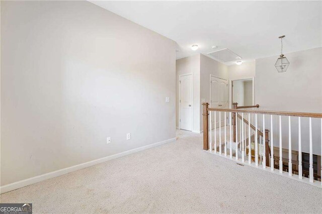 100 Trailside Way, Hiram, GA 30141 - spare room with attic access, carpet, and baseboards