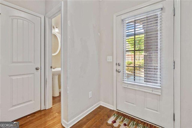 100 Trailside Way, Hiram, GA 30141 - doorway with wood finished floors and baseboards