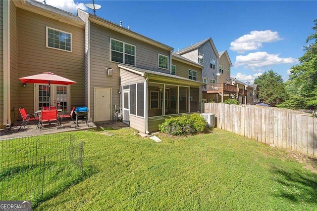 100 Trailside Way, Hiram, GA 30141 - rear view of house featuring a sunroom, central AC unit, and a patio area