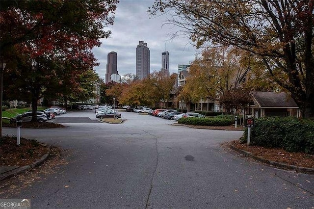1015 Mcgill Park Ave NE, Atlanta, GA 30312 - view of asphalt street featuring curbs and a skyline view