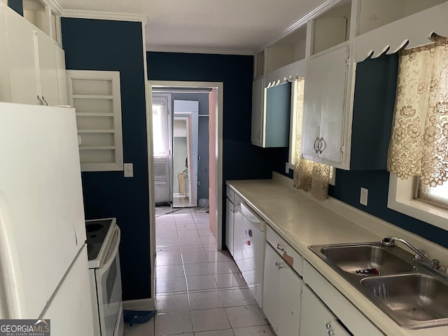 306 Greenview St, Jesup, GA 31545 - kitchen featuring white appliances, a sink, ornamental molding, white cabinetry, and light tile patterned floors
