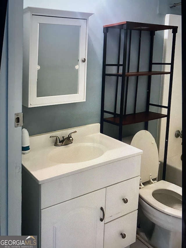 306 Greenview St, Jesup, GA 31545 - bathroom with vanity and toilet