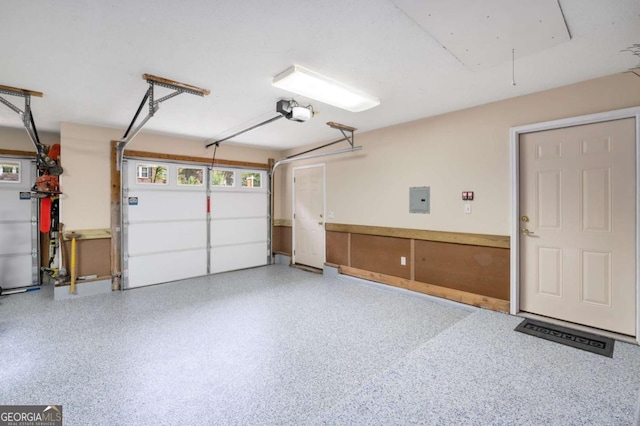 228 Clarion Ave, Decatur, GA 30030 - garage with electric panel and a garage door opener