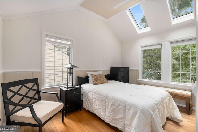 228 Clarion Ave, Decatur, GA 30030 - bedroom featuring light wood finished floors, vaulted ceiling, and a skylight