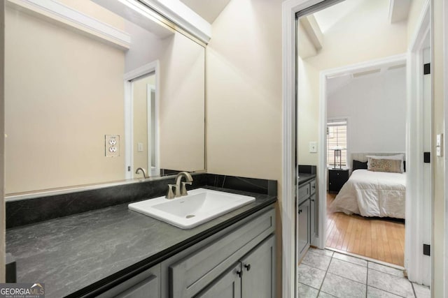 228 Clarion Ave, Decatur, GA 30030 - bathroom featuring vanity, tile patterned flooring, and ensuite bathroom