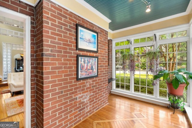 228 Clarion Ave, Decatur, GA 30030 - unfurnished sunroom featuring hardwood / wood-style floors and ornamental molding
