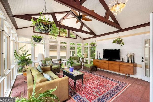 228 Clarion Ave, Decatur, GA 30030 - sunroom / solarium with brick flooring, plenty of natural light, beamed ceiling, high vaulted ceiling, and a chandelier