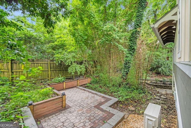 228 Clarion Ave, Decatur, GA 30030 - view of yard with a patio and a garden