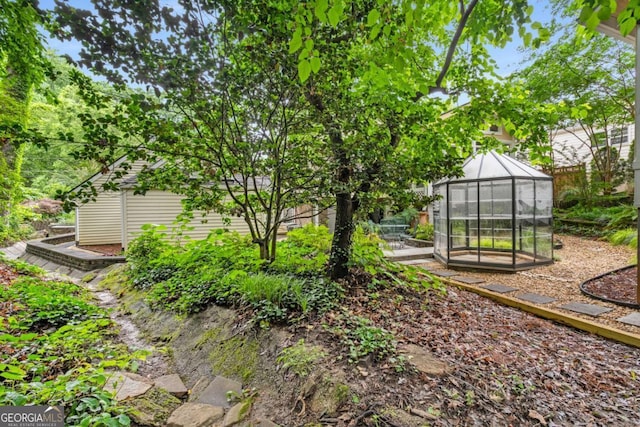 228 Clarion Ave, Decatur, GA 30030 - view of yard featuring an exterior structure and an outdoor structure