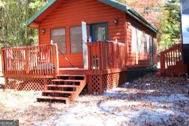 95 Hillcrest Ct, Cleveland, GA 30528 - view of front of property with a wooden deck and faux log siding