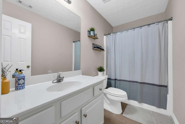 502 Stoneland Pl, Lawrenceville, GA 30046 - bathroom with vanity, toilet, tile patterned floors, a textured ceiling, and a shower with curtain