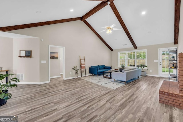 502 Stoneland Pl, Lawrenceville, GA 30046 - living room featuring beam ceiling, wood finished floors, high vaulted ceiling, a ceiling fan, and recessed lighting