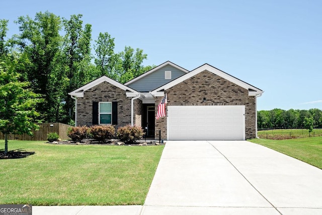 174 Silver Birch Pass, Newnan, GA 30265 - view of front facade with a garage, driveway, and brick siding