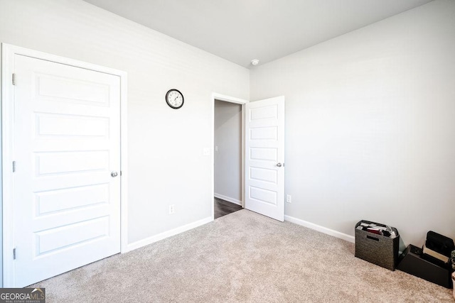 174 Silver Birch Pass, Newnan, GA 30265 - unfurnished bedroom with carpet flooring and baseboards