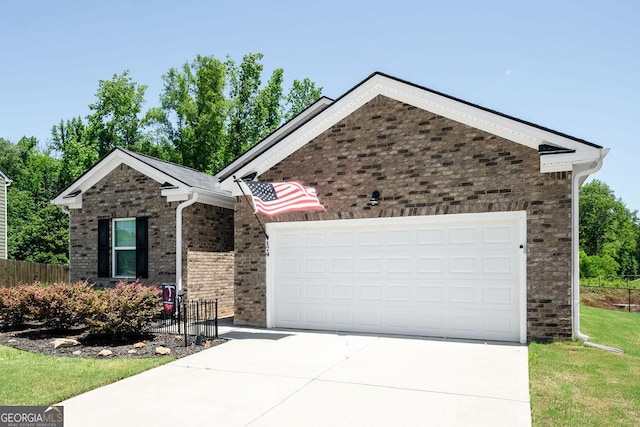 174 Silver Birch Pass, Newnan, GA 30265 - ranch-style house featuring concrete driveway and a garage