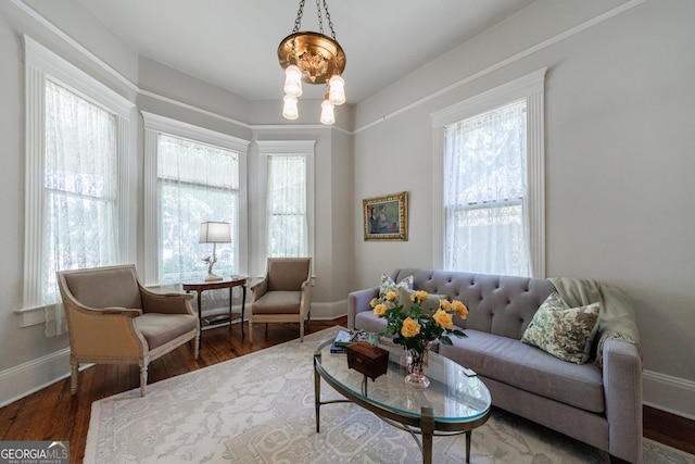 381 Cherokee Ave SE, Atlanta, GA 30312 - living room with wood finished floors and a chandelier