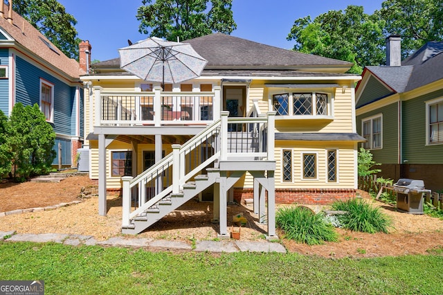 381 Cherokee Ave SE, Atlanta, GA 30312 - rear view of house featuring a deck, stairs, and roof with shingles