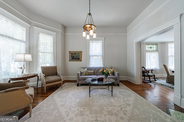 381 Cherokee Ave SE, Atlanta, GA 30312 - living room with a chandelier and wood finished floors