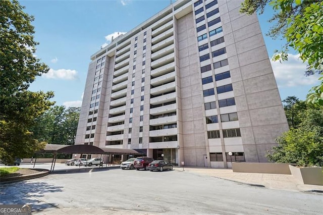 3530 Piedmont Rd NE Unit 2I, Atlanta, GA 30305 - view of property with uncovered parking