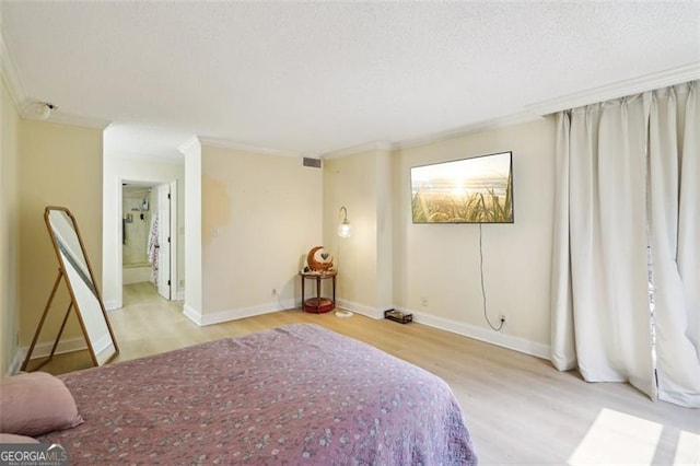 3530 Piedmont Rd NE Unit 2I, Atlanta, GA 30305 - bedroom with wood finished floors and crown molding