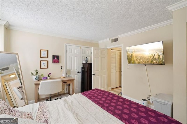 3530 Piedmont Rd NE Unit 2I, Atlanta, GA 30305 - bedroom with a textured ceiling, ornamental molding, and a closet