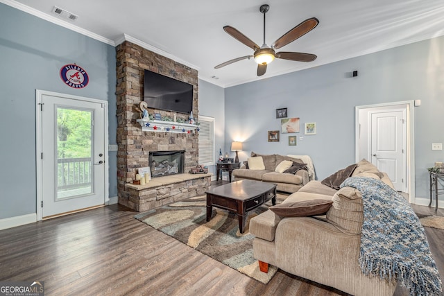 405 Dugas Rd, Dahlonega, GA 30533 - living room featuring ceiling fan, ornamental molding, wood finished floors, a stone fireplace, and baseboards