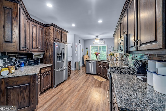 405 Dugas Rd, Dahlonega, GA 30533 - kitchen featuring stainless steel appliances, a sink, dark brown cabinetry, a ceiling fan, and light wood finished floors