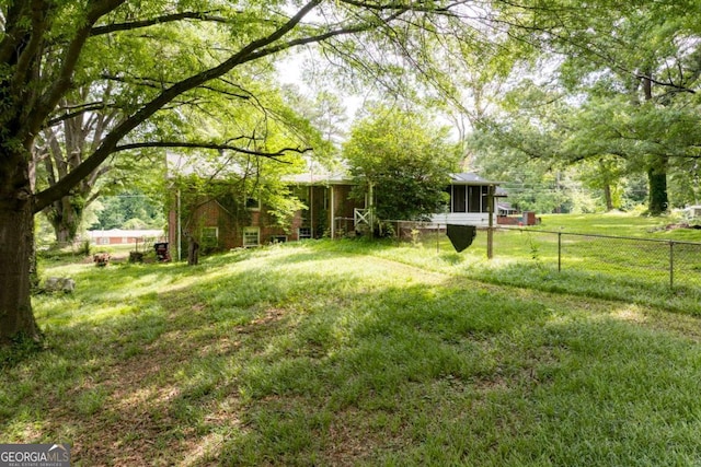 1395 Clay Rd SW, Mableton, GA 30126 - view of yard featuring a sunroom