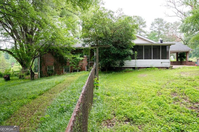 1395 Clay Rd SW, Mableton, GA 30126 - view of green lawn featuring a sunroom