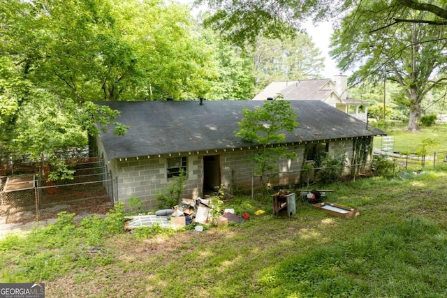 1395 Clay Rd SW, Mableton, GA 30126 - back of property featuring a shingled roof and concrete block siding