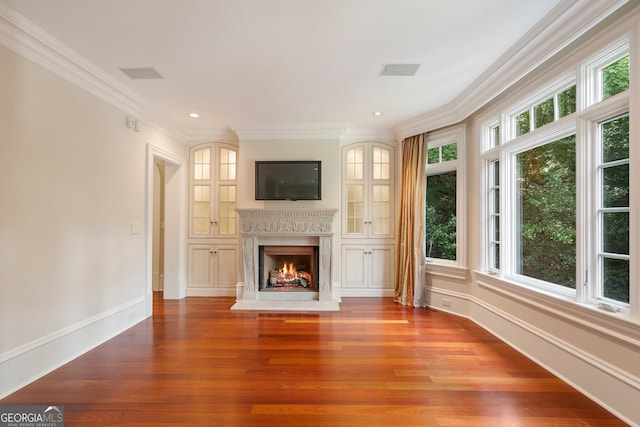 760 River Gate Dr, Atlanta, GA 30350 - unfurnished living room with crown molding, wood finished floors, a fireplace, and recessed lighting