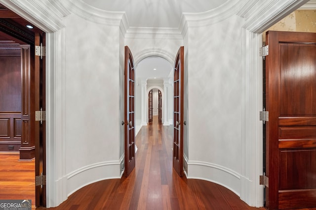 760 River Gate Dr, Atlanta, GA 30350 - hallway featuring arched walkways, french doors, ornamental molding, and wood finished floors