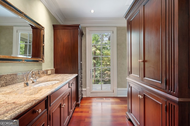 760 River Gate Dr, Atlanta, GA 30350 - bathroom with wood finished floors, vanity, and crown molding