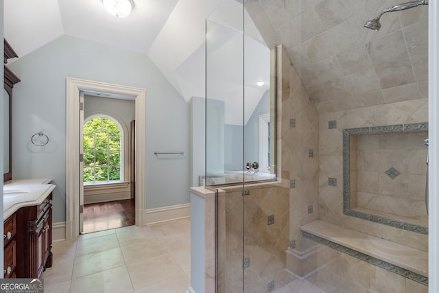 760 River Gate Dr, Atlanta, GA 30350 - bathroom featuring vanity, lofted ceiling, a shower stall, and tile patterned floors