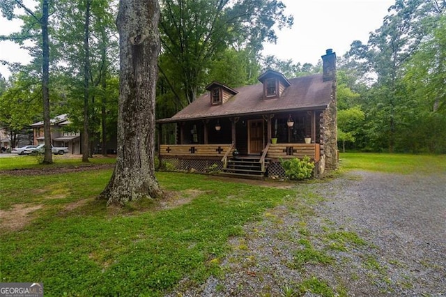 218 Green Acre Ln, Cartersville, GA 30121 - view of front of house featuring a chimney, covered porch, and a front yard