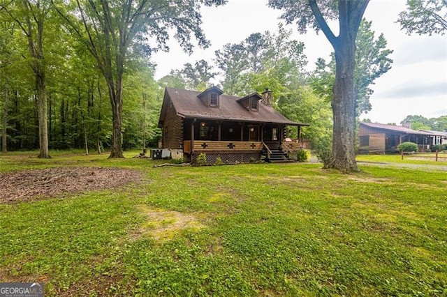 218 Green Acre Ln, Cartersville, GA 30121 - log home featuring a front lawn, a porch, central AC, and a chimney