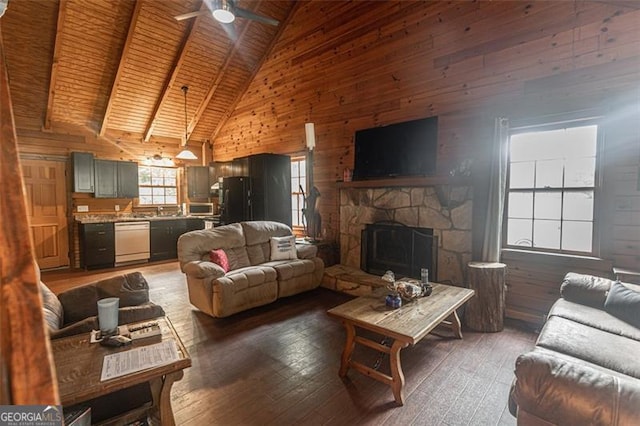 218 Green Acre Ln, Cartersville, GA 30121 - living area with wooden walls, high vaulted ceiling, light wood-style floors, ceiling fan, and a fireplace
