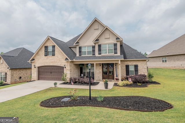 924 Abingdon Cv, Bonaire, GA 31005 - craftsman-style home with brick siding, a garage, driveway, a shingled roof, and a front lawn